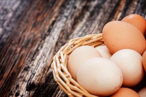 Eggs in a basket Stock Photos
