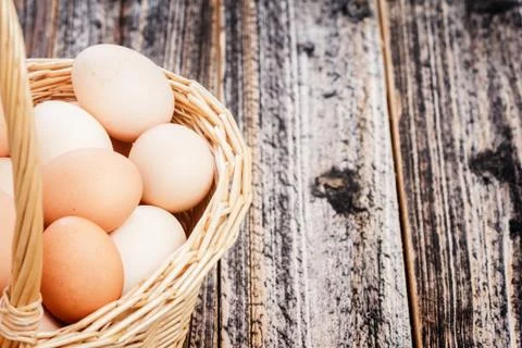 Eggs in a basket Stock Photos