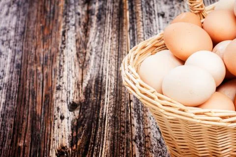 Eggs in a basket Stock Photos