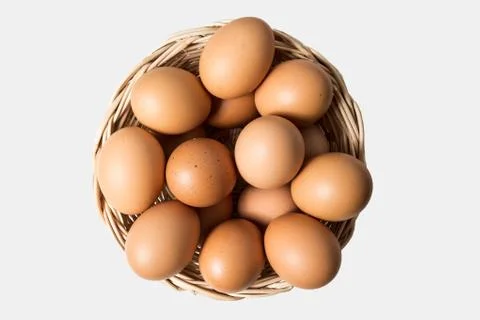 Eggs in basket Stock Photos