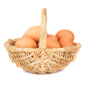 Eggs in basket Stock Photos