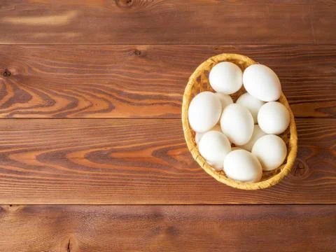 Eggs in the basket Stock Photos