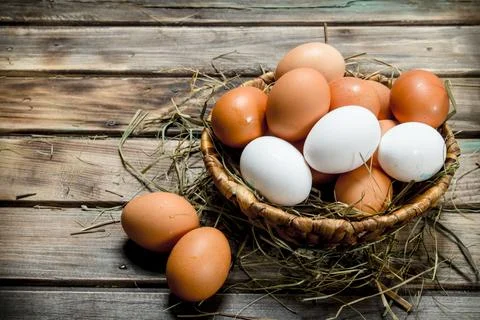 Eggs in a basket. Stock Photos