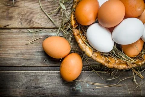 Eggs in a basket. Stock Photos