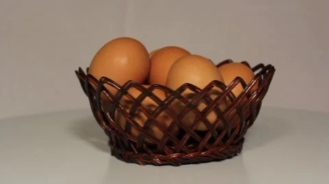 Eggs in the basket rotating Stock Footage 7738952