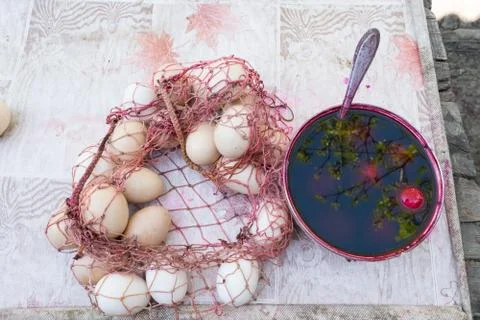 Eggs being painted in for the Easter in a rural area Stock Photos