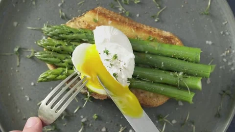 Eggs Benedict with Asparagus Stock Footage 244712521