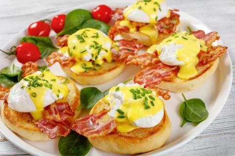 Eggs Benedict on a plate, close-up Stock Photos