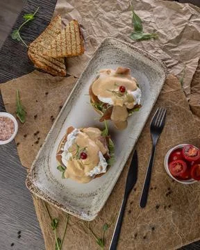 Eggs benedict with poached eggs Stock Photos