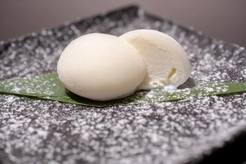 Eggs on a black plate Stock Photos