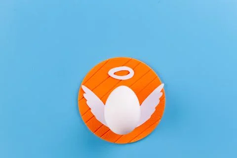 Eggs on blue background Stock Photos