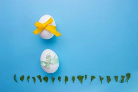 Eggs on blue background Stock Photos