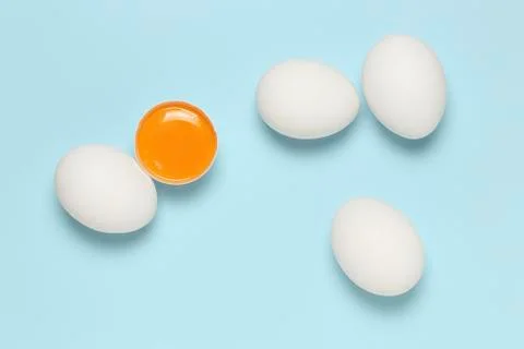 Eggs on blue Stock Photos