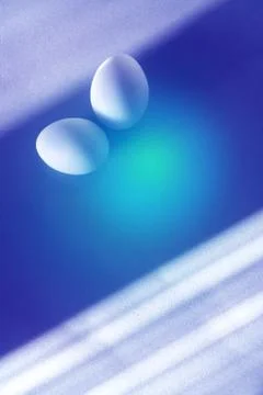 Eggs on a blue-turquoise background. Foto stock