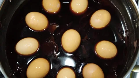 The eggs boiled in pot with onion peels for coloring. Preparation for Ester Stock Footage 260814209