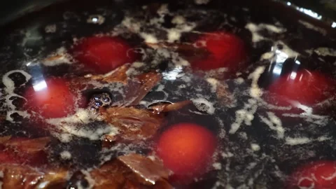 The eggs boiled in pot with onion peels for coloring. Preparation for Ester Stock Footage 260814269
