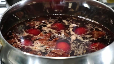 The eggs boiled in pot with onion peels for coloring. Preparation for Ester Stock Footage 260814288