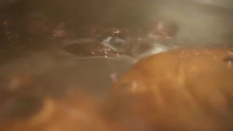 Eggs Boiling in Hot Water Cooking Stock Footage 123530987