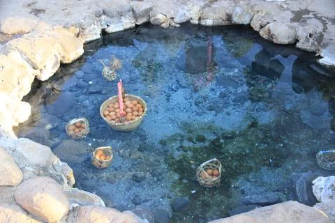 Eggs boiling in the natural hot spring in National Park Chae Son. Stock Photos