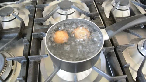 Eggs Boiling in Pan Stock Footage 111096838