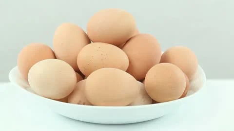 Eggs in a bowl Stock Footage 10760438