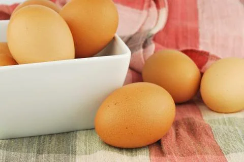 Eggs in a bowl Stock Photos