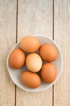 Eggs in a bowl Stock Photos