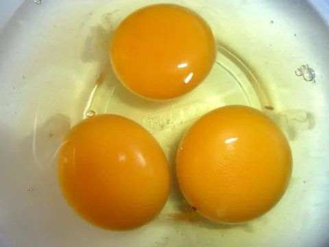 Eggs in a bowl Stock Photos