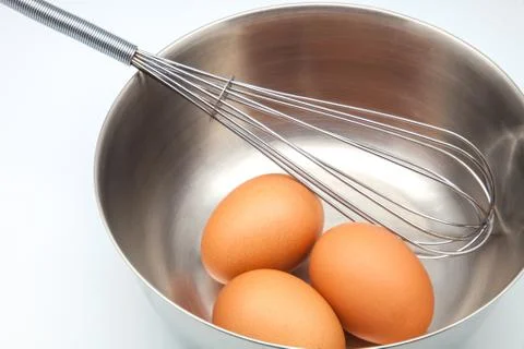 Eggs in bowl Stock Photos