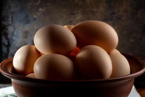 Eggs in a bowl Stock Photos