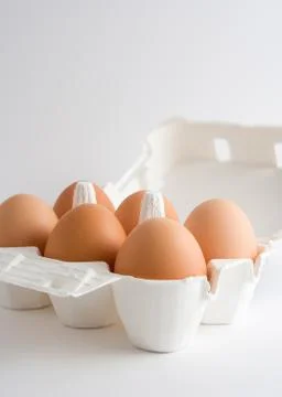 Eggs in a box Stock Photos