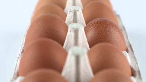 Eggs with brown shell isolated on white Stock Footage 72516392