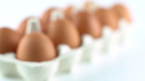 Eggs with brown shell isolated on white Stock Footage 72517060