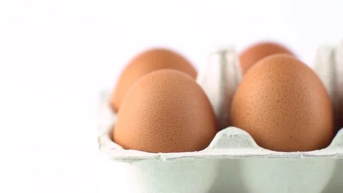 Eggs with brown shell isolated on white Stock Footage 72517270