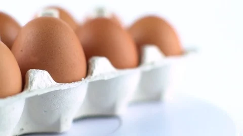 Eggs with brown shell isolated on white Stock Footage 72517321