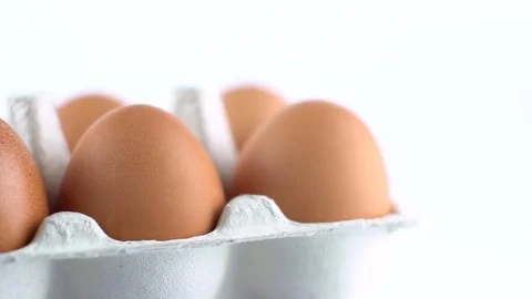 Eggs with brown shell isolated on white Stock Footage 72517390