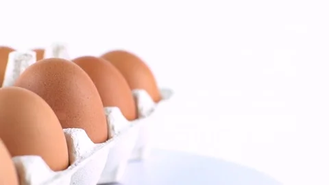 Eggs with brown shell isolated on white Stock Footage 72517463