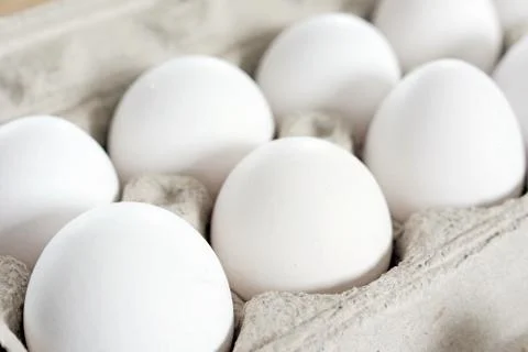 Eggs in cardboard crate-2 Stock Photos