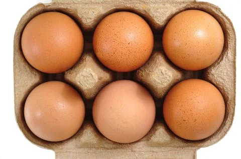 Eggs in carton Stock Photos