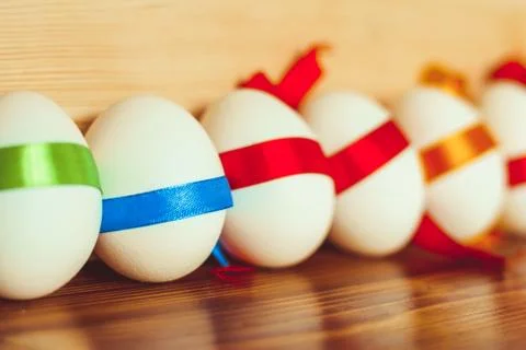 Eggs colored ribbon Stock Photos