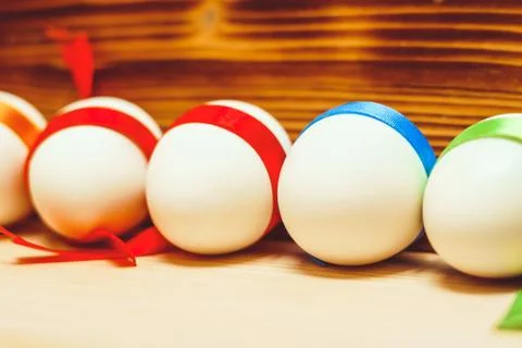 Eggs colored ribbon Stock Photos
