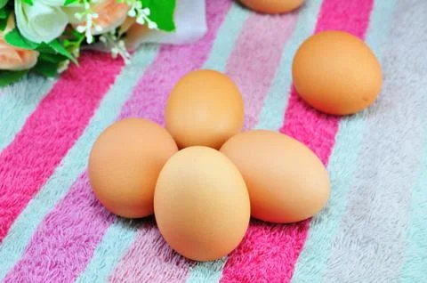 Eggs on colorful background Stock Photos