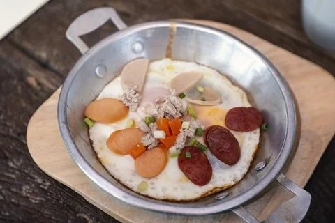 Eggs cooked in a pan Stock Photos