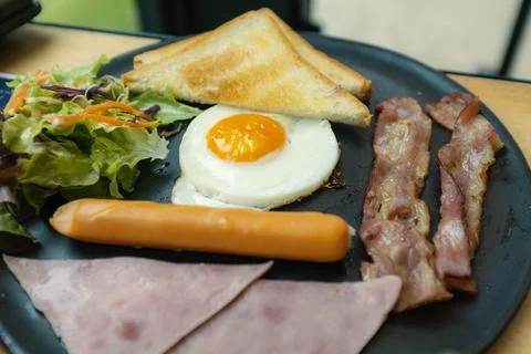 Eggs cooked in a pan Stock Photos