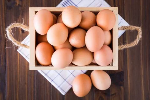 Eggs in crate Stock Photos