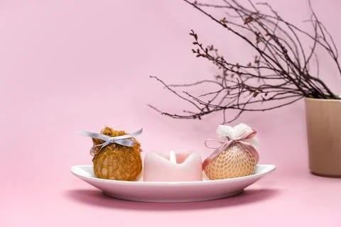 Eggs decorated with ribbons on a plate. Easter background Stock Photos
