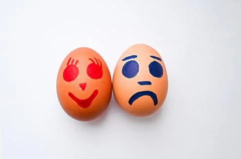 Eggs with different emotions as a concept Stock Photos