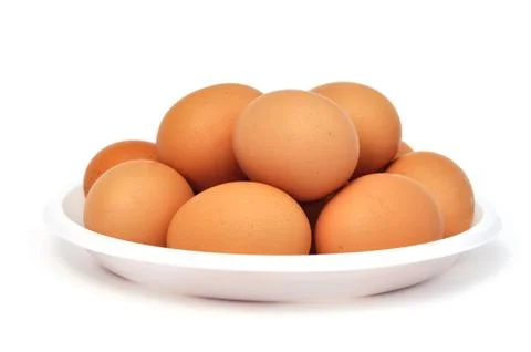 Eggs in a dish (isolated) Stock Photos
