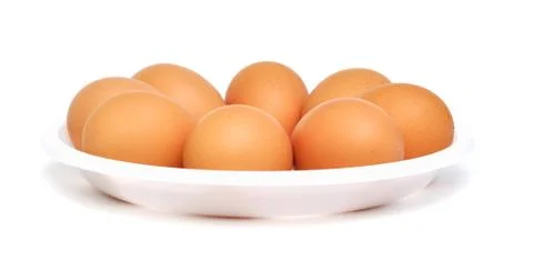 Eggs in a dish Stock Photos