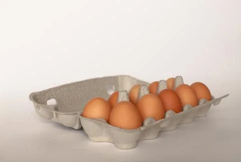 Eggs in an egg container. Stock Photos